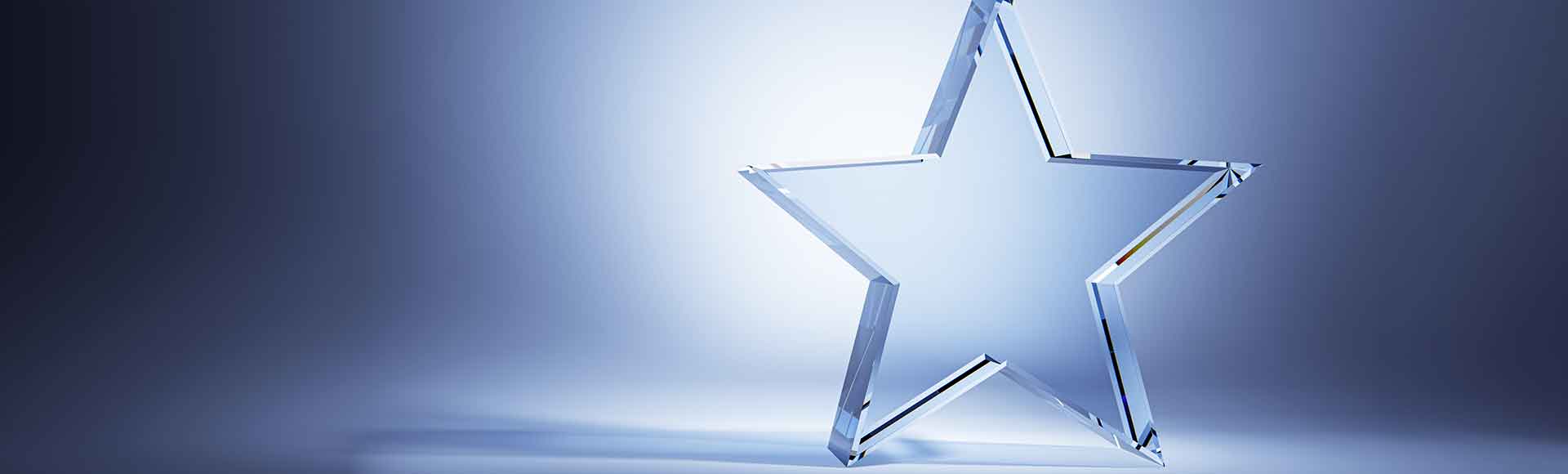 Glass star trophy on blue gradient background. 3D Rendering